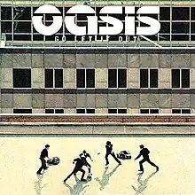 The single cover depicts five men playing football on a rooftop. The band name is written in large text and the title of the song is written in small lettering, in uppercase.