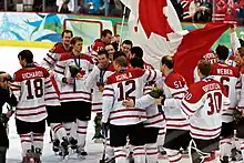 Players celebrating on ice