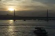 Golden Horn Metro Bridge from Galata Bridge in sunset