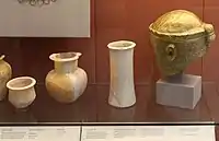 Alabaster vases and helmet from the grave of Meskalamdug, grave PG 755