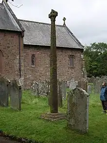 Image 34The Gosforth Cross, 10th-century Viking-age sculpture. (A replica of 1887, with clearer depictions of the decoration, may be found in the churchyard at Aspatria, along with a replica of another cross, the original of which is at Dearham) (from History of Cumbria)