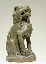 A sitting celadon lion, dated 11th to 12th century, Song dynasty