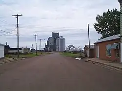 View of the main road looking towards a grain elevator