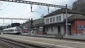 Two-story building with hip roof