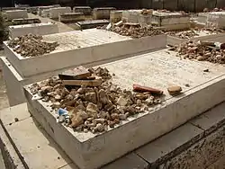 Graves of the first Dushinsky Rebbe, Rabbi Yosef Tzvi Dushinsky (foreground) and his son, Rabbi Yisroel Moshe Dushinsky, second Dushinsky Rebbe (background)