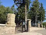 The original portion of this ring-wall dates from 1857 and was erected when the Nederduitse Gereformeerde (NG) Church cemetery was laid out.
A joint fund-raising campaign by the NG
and the Anglican congregations in 1887 enabled them to extend the ring-wall.
Type of site: Graveyard