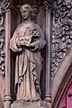 Statue carved from red sandstone on Grayfriars Church, Dumfries