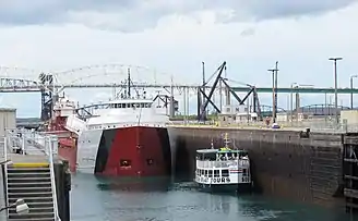 The tour boat Hiawatha and the laker Cason J. Callaway share the Poe Lock