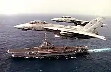 F-14 Tomcats overfly Foch in 1990 during an exercise.