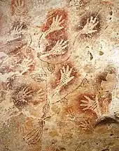 Image 51Hand stencils in the "Tree of Life" cave painting in Gua Tewet, Kalimantan, Indonesia (from History of painting)