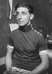 Seated man in cycling uniform