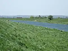 The water level in the River Glen, here pictured looking west towards Guthram Gowt, is maintained by a tidal sluice at Surfleet Seas End. The sluice might be replaced by a lock.