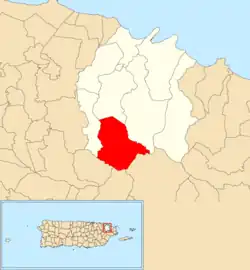 Location of Guzmán Arriba within the municipality of Río Grande shown in red