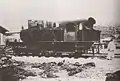 Mogai class locomotive in Korea in 1906. Note the buffers-and-chain coupler.