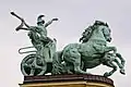 Charioteer with a snake, symbolising War