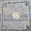 Manhole cover in downtown of Haifa, Israel