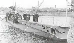 Submarine with crew on deck