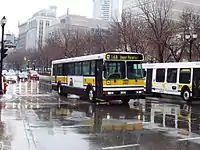 Hamilton Street Railway Orion V 8907 on the 34A route at the intersection of King and James Streets in downtown Hamilton.