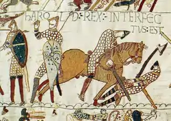 The death of King Harold, from the Bayeux Tapestry.  The shields look heraldic, but do not seem to have been personal or hereditary emblems.