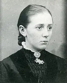 Black and white portrait of Harriett Starr Stewart in Victorian dress.