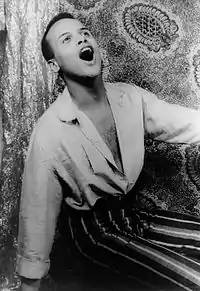 Image 10Harry Belafonte in 1954, whose breakthrough album Calypso (1956) was the first million-selling LP by a single artist. (from 1950s)