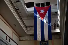 A Cuban flag hanging inside the station building