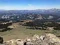 From summit, view southwest of the Calpine Road approach.Round Top in upper right corner.