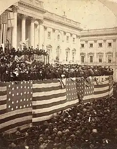 A large crowd of people outside the United States Capitol building