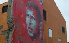 Mural covering a Berlin Wall segment in Lille OSC training center