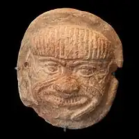 Terracotta plaquette with head of Humbaba, 2nd millennium BCE, Louvre Museum, Paris