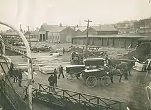 Horse-drawn hearses and caskets on the Halifax wharf