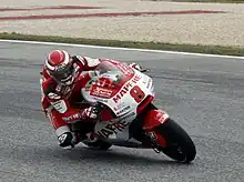 Héctor Barberá riding the Aspar Ducati GP11 at the 2011 Portuguese Grand Prix.