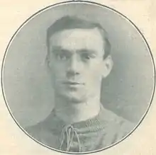 Faded photo of a clean-shaven white man in a sports jersey