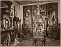 Henry C. Gibson drawing room (decorated c. 1870, demolished), Furness & Hewitt, architects. The Neo-Grec library table (foreground) is now at the Detroit Institute of Arts.