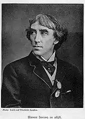 head and shoulder portrait of clean-shaven white man with longish hair