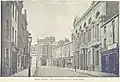 Rugby High Street in 1893, the building second to the right was the first Town Hall of 1857. Destroyed by fire in 1921.