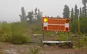 Sign in Eagle Plains: "High winds and blowing snow"