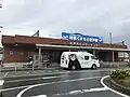 The south entrance of the station. The bus in front is the Kumamoto Airport Liner.