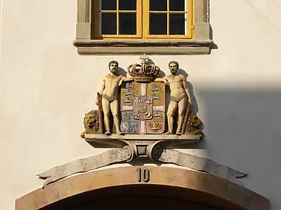 Heraldic statuary above the doorway