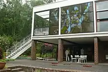 stairs to the balcony next to the dining room