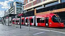 A light-rail vehicle of the Newcastle Light Rail on Honeysuckle, a urban development in Newcastle, Australia