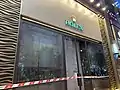 The glass of a watch shop on Russell Street was damaged by a pepper ball gun fired by the police.