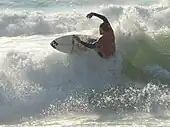 A surfer at Soorts-Hossegor, considered as one of the best surfing spots in the world.