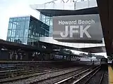 View of subway platforms, with the transfer building above the platforms