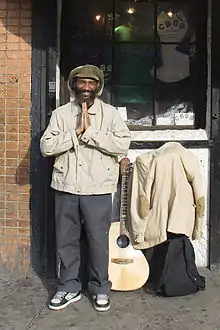 H.R. outside of New York's CBGB in 2006