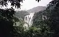 A view of Huangguoshu Waterfall from across and above the river