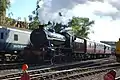 The K4 hauling a passenger train down the demonstration line at Barrow Hill Roundhouse