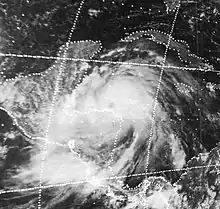 Low-resolution satellite image of a tropical cyclone to the east of Central America