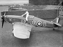 Pilot Officer "Taffy" Clowes climbing into his No. 1 Squadron Hawker Hurricane Mk.I at RAF Wittering, in October 1940.