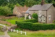 Dwellings on the village green and beck